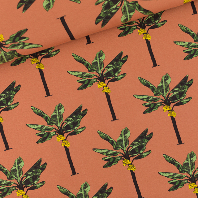 French terry in zachte roestkleur met bananenbomen - 'Banana Palms' van 'See You At Six'